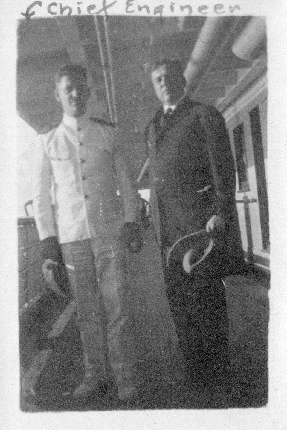 Senior Engineer Weighs in on AI-Assisted Development, Draws Minimal HN Engagement — Thomas Boles Poses with Chief Engineer Aboard a Ship